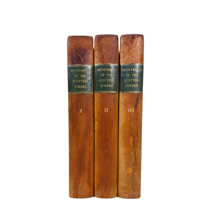 Three wooden books titled 'Ministry of the Scottish Border' on a white background
