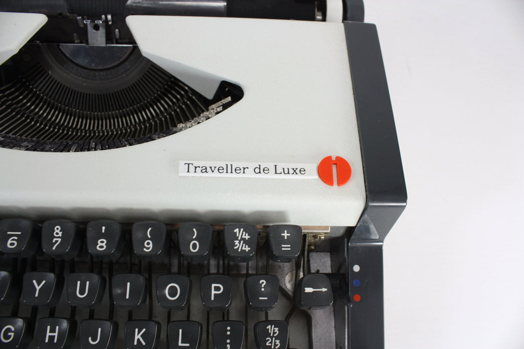 Vintage Olympia Traveller de Luxe portable typewriter in carry case