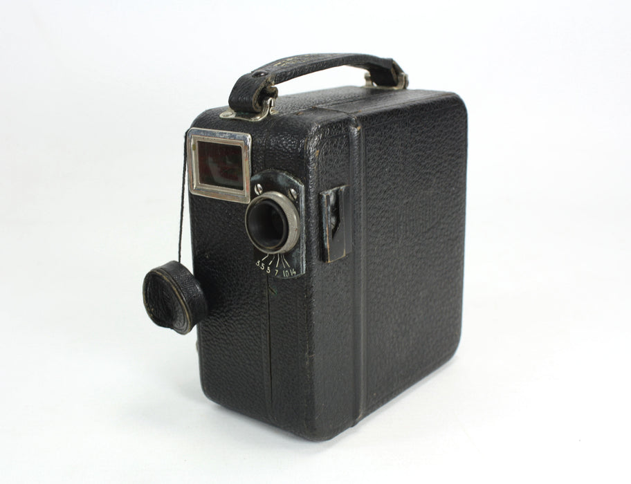 Vintage Pathescope Motocamera with unused film and accessories, c. 1930