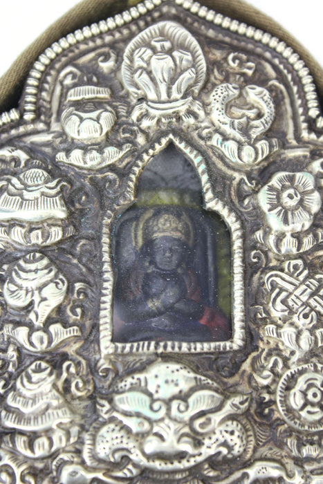 Tibetan Ghau amulet box containing Tsa Tsa