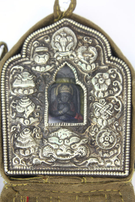 Tibetan Ghau amulet box containing Tsa Tsa