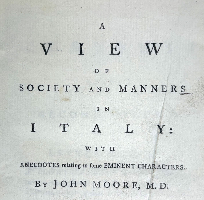 A vintage book or pamphlet cover with black serif text printed on aged off-white paper. The title reads: 'A VIEW OF SOCIETY AND MANNERS IN ITALY: WITH ANECDOTES relating to some EMINENT CHARACTERS.