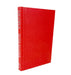A hardcover book titled 'AMADUS' by Peter Shaffer, standing upright at a slight angle. The book features a textured red cloth cover with the title and author name printed in white on the spine, set against a plain white background.
