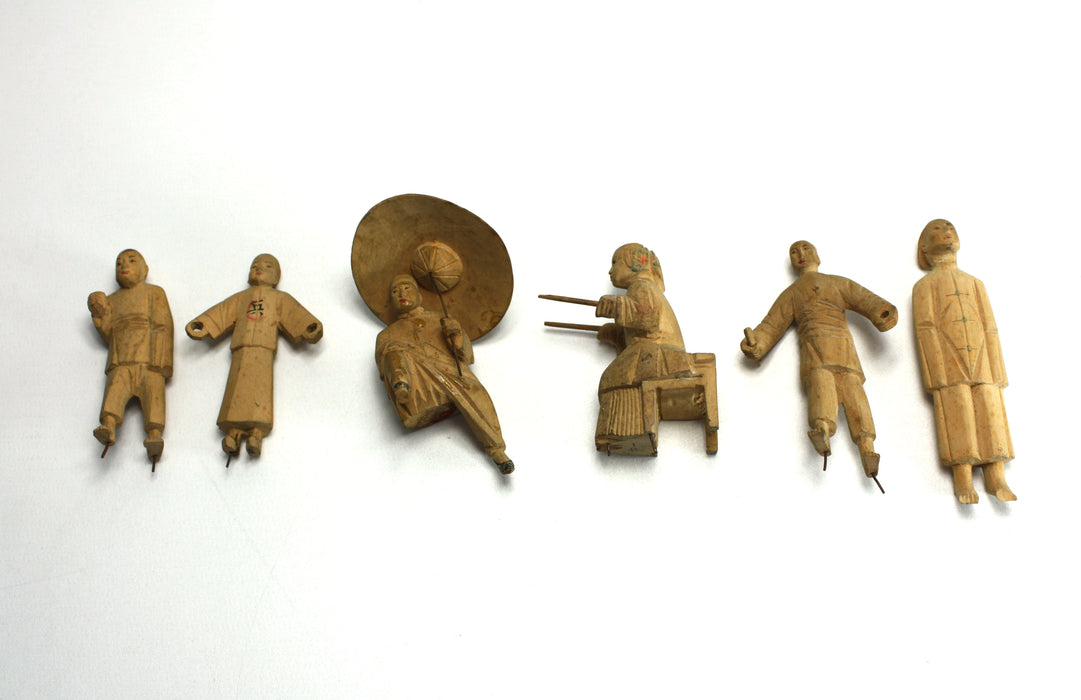 A Collection of Vintage Carved Chinese figures in wood. Intricately carved and finely detailed.