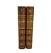 Two antique leather-bound books standing upright side by side on a white background. The spines are brown with gold lettering and decorative bands, and the titles read 'History of Rome' and 'Arnold III'.