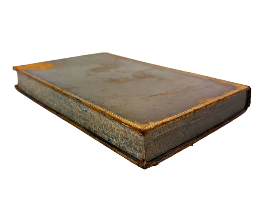 Vintage leather-bound book on a white background