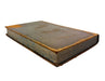 Vintage leather-bound book on a white background