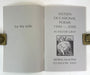 An open book or booklet showing printed cover pages with the title 'SIXTEEN OCCASIONAL POEMS 1990 — 2000' and author 'ALASDAIR GRAY,' plus 'for my wife' on the left page and 'MORAG McALPINE GLASGOW 2000' on the right page. The pages are light gray with black text and a small black-and-white illustration, photographed against a white background with brass-colored edge supports visible on both sides.