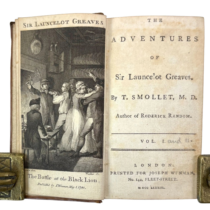An open antique book showing the title page and front cover illustration for 'The Adventures of Sir Launcelot Greaves' by T. Smollet, M.