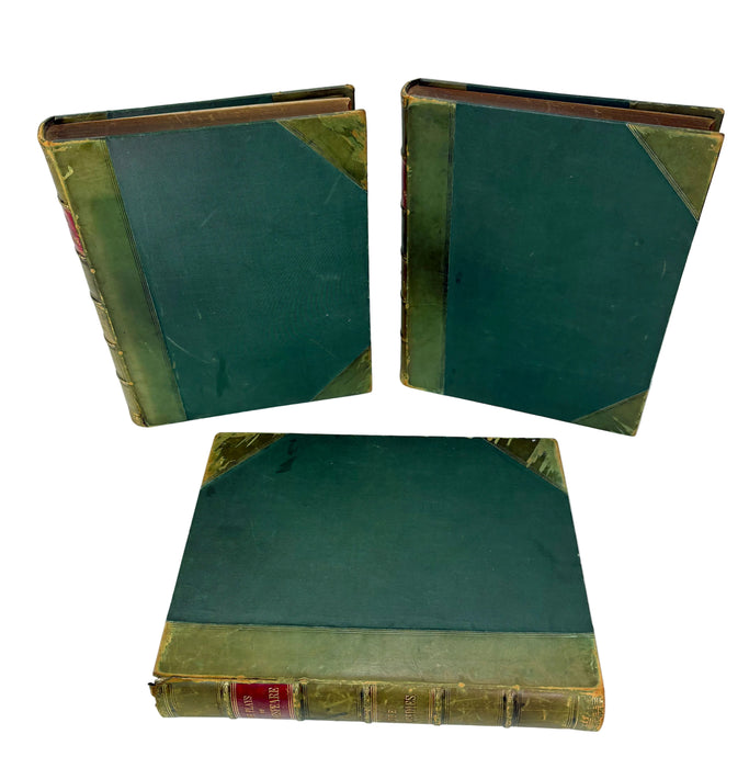 Three vintage hardcover books with dark green covers and gold-ochre tooling on the corners and spine, arranged on a white background with two standing upright and one lying flat.