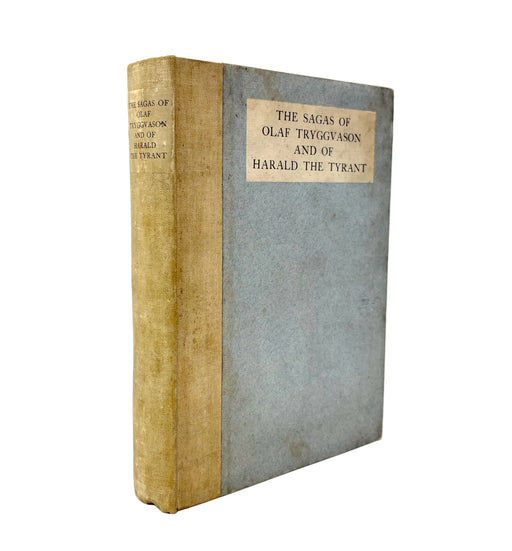 An antique hardcover book titled 'The Sagas of Olaf Tryggvason and of Harald the Tyrant' standing upright against a plain white background. The book features a blue-gray cloth cover on the front with a beige paper label, and a tan-gold cloth spine.