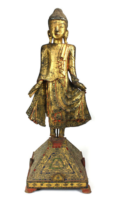 Burmese antique A large lacquered and gilt teakwood standing Buddha Burma