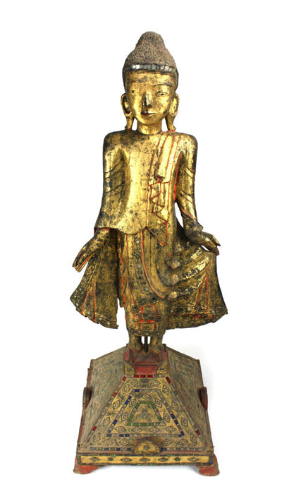 Burmese antique A large lacquered and gilt teakwood standing Buddha Burma