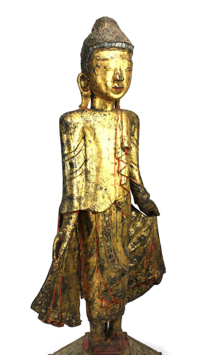 Burmese antique A large lacquered and gilt teakwood standing Buddha Burma