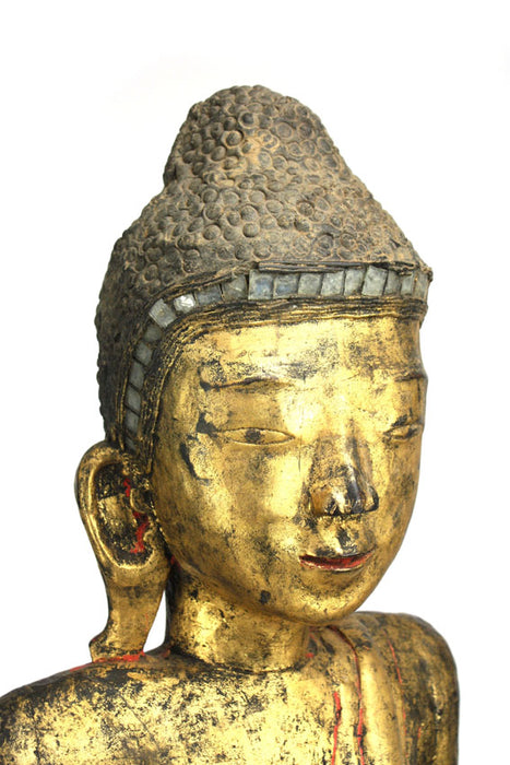 Burmese antique A large lacquered and gilt teakwood standing Buddha Burma