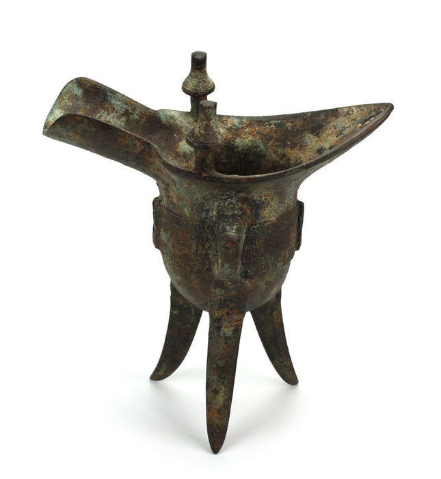 Chinese bronze jue drinking vessel, archaic form