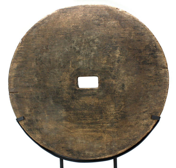 Antique Thai cart wheel mounted on stand 1